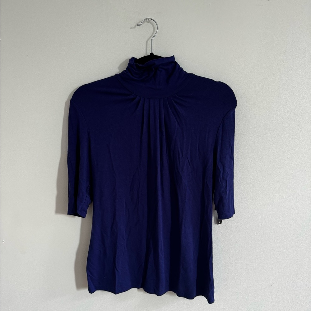 Blue turtle neck blouse. Business casual